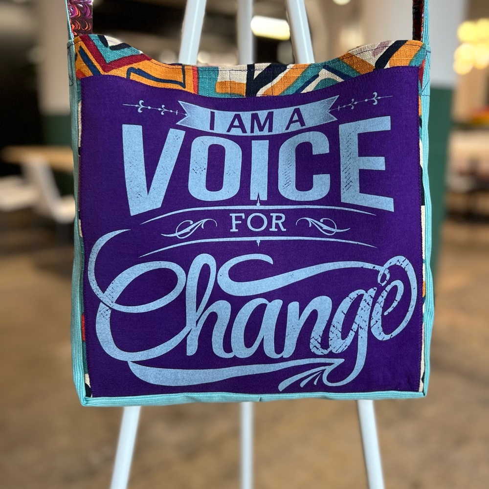 Voice for change tshirt crossbody bag